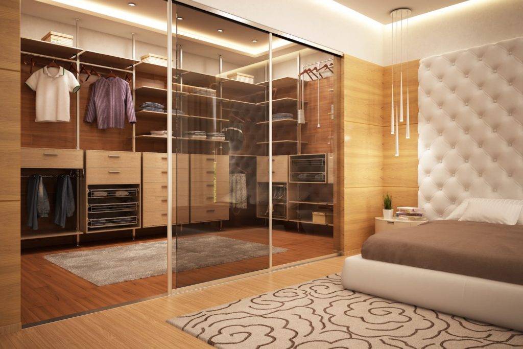 a sliding door wardrobe in a bedroom