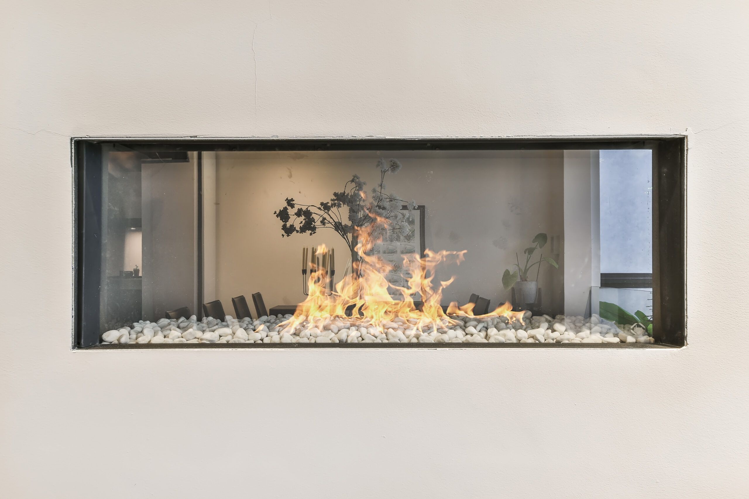 Modern Fireplace In White Wall